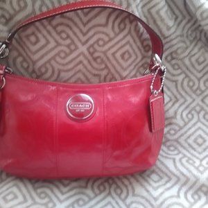 Coach red quilted red small shoulder bag.